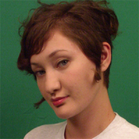 Katie Masters Young woman with short, reddish-brown hair